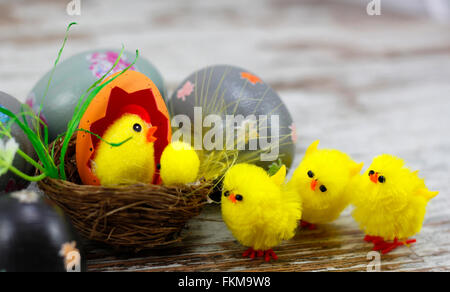 Decorated easter eggs and figurine chicks Stock Photo