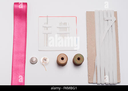 sewing tools and accessories on white background Stock Photo