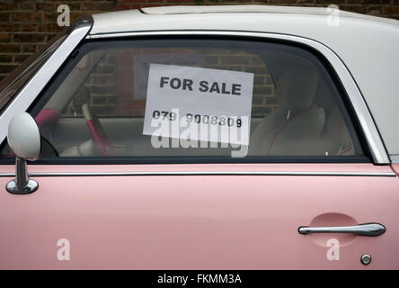 Nissan Figaro retro style car for sale in North London Stock Photo