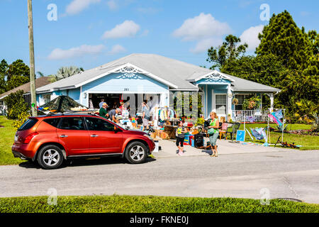 A typical weekend yard sale or Garage sale at a home in Florida Stock Photo