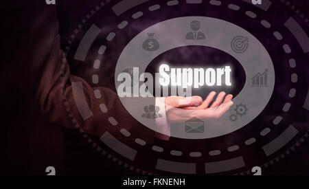 Businessman pressing an Support concept button. Stock Photo