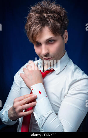 man with ace in sleeve Stock Photo