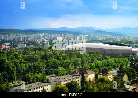 Cluj, Cluj-Napoca, Romania - July 12, 2015: View of th Cluj Arena, Central Park Simion Barnutiu with the Marasti area in a sunny Stock Photo