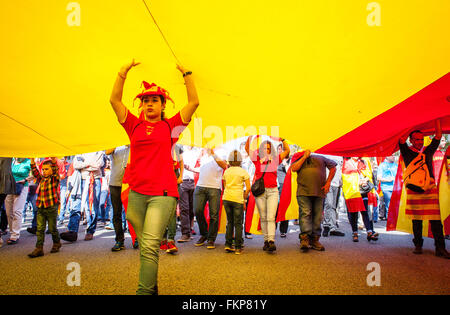 Anti-independence Catalan protestors carry Spanish flag during a demonstration for the unity of Spain on the occasion of the Spa Stock Photo