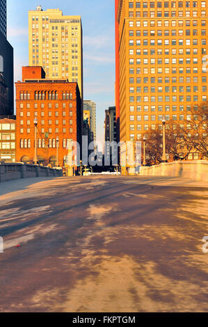 A pedestrian bridge links Grant Park with  venerable buildings along Michigan Avenue in Chicago's south Loop. Chicago, Illinois, USA. Stock Photo