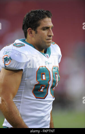 NO FILM, NO VIDEO, NO TV, NO DOCUMENTARY - Anthony Fasano of the Miami  Dolphins celebrates a touchdown with Roberto Wallace (18) in the second  quarter of an NFL game against the