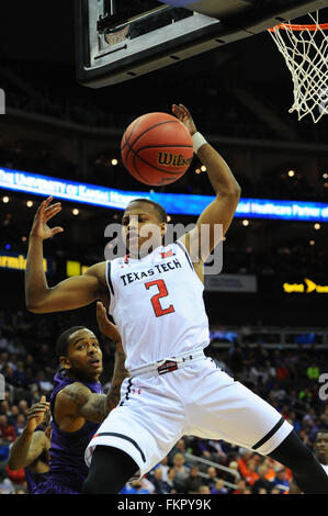 KANSAS CITY, MO - MARCH 09: West Virginia guard Kedrian Johnson (0 ...