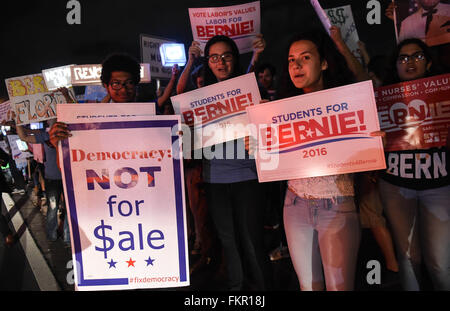 Miami, USA. 9th Mar, 2016. Supporters of Democratic presidential candidate Bernie Sanders rally at Miami-Dade community college-Kendall campus in Miami, Florida, the United States, March 9, 2016. Democratic presidential candidates Hillary Clinton and Bernie Sanders took part in the Univision News and Washington Post Democratic presidential candidates debate here on Wednesday. Credit:  Bao Dandan/Xinhua/Alamy Live News Stock Photo