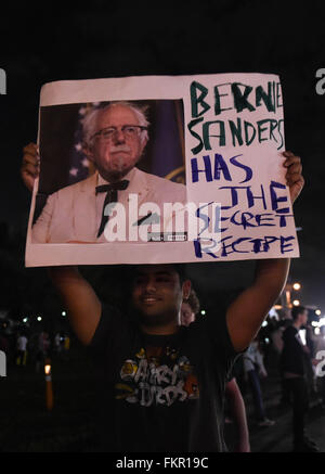 Miami, USA. 9th Mar, 2016. Supporters of Democratic presidential candidate Bernie Sanders rally at Miami-Dade community college-Kendall campus in Miami, Florida, the United States, March 9, 2016. Democratic presidential candidates Hillary Clinton and Bernie Sanders took part in the Univision News and Washington Post Democratic presidential candidates debate here on Wednesday. Credit:  Bao Dandan/Xinhua/Alamy Live News Stock Photo