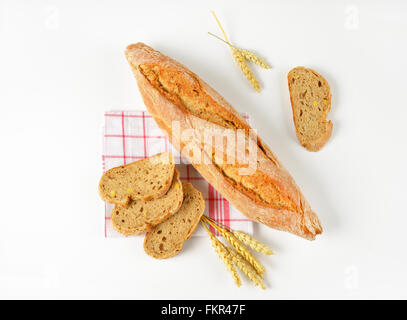 freshly baked french baguette on white background Stock Photo