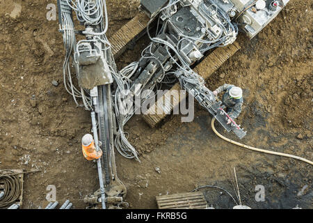 Caucasian workers at construction site Stock Photo