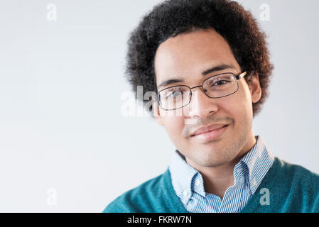 Mixed race man smiling Stock Photo