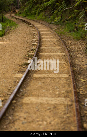 High angle view of train tracks in sand Stock Photo