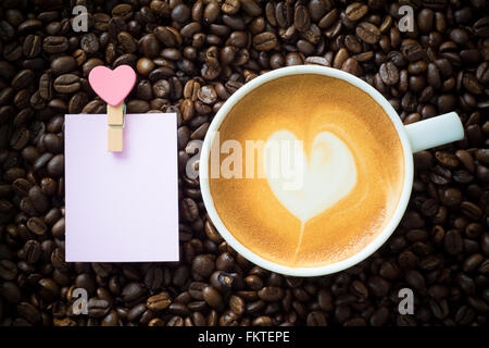 hot coffee on coffee bean background Stock Photo