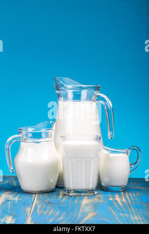 Natural fresh milk on blue background Stock Photo