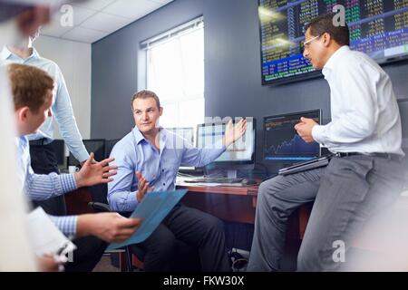 Colleagues in office having discussion, hand gestures Stock Photo