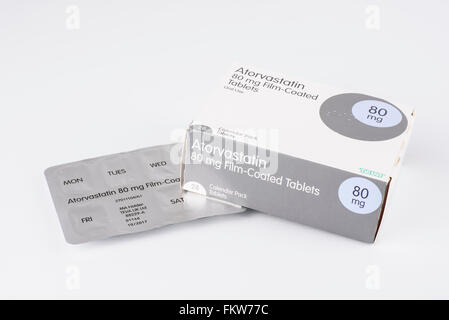 Packet of 80mg Atorvastatin capsules against a white background Stock Photo