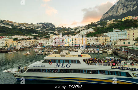 Sunset over Marina Grande ,Capri Island .Cruise transportation to one of the most popular travel location in the world. Stock Photo