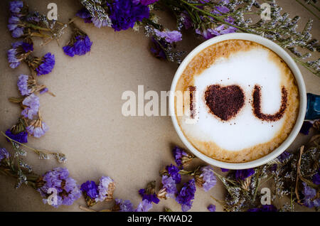 hot coffee with foam milk art I LOVE U pattern Stock Photo