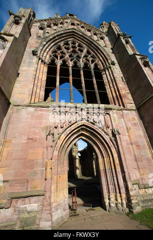 Town of Melrose, Scotland. Close up view of the tower architecture on the south elevation of the 12th century Melrose Abbey. Stock Photo