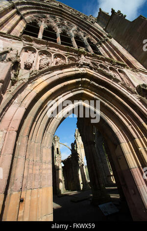 Town of Melrose, Scotland. Close up view of the tower architecture on the south elevation of the 12th century Melrose Abbey. Stock Photo