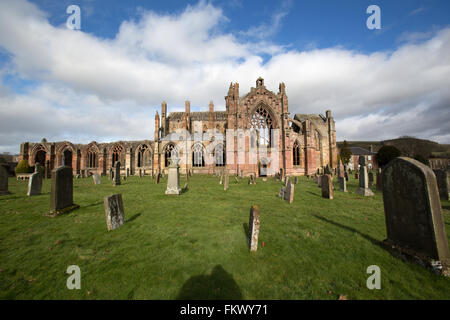 Town of Melrose, Scotland. The south elevation of the picturesque 12th century Melrose Abbey ruins. Stock Photo