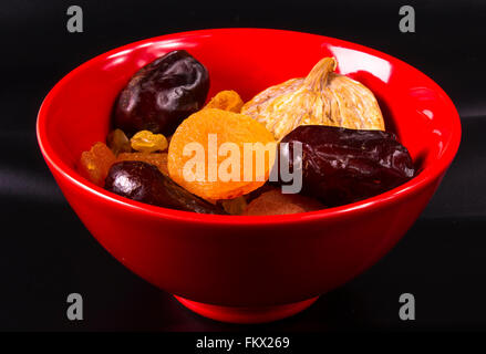 various dried fruits on the black background Stock Photo