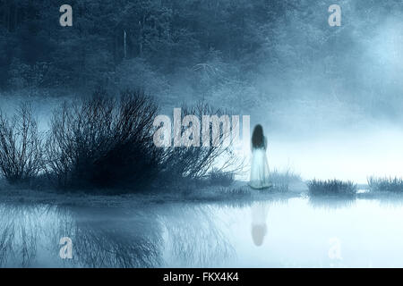 Mysterious Woman in the Mist Stock Photo