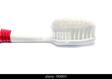 colored toothbrushes on white background close up Stock Photo
