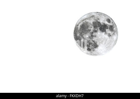 The full Moon is seen isolated on a white background. High contrast, high resolution image taken with a full frame dslr camera. Stock Photo