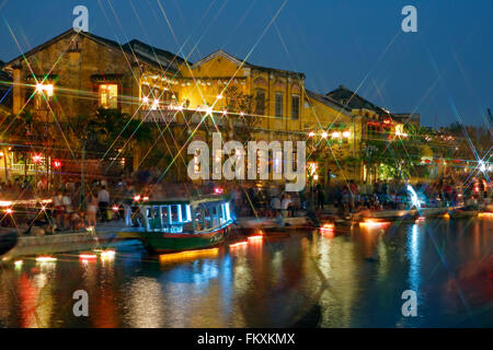 Buildings and Thu Bon River during monthly Full Moon Lantern Festival, Hoi An, Vietnam Stock Photo