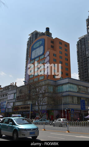 Kunming, Kunming, CHN. 10th Mar, 2016. A phone-shaped mall in Kunming. The buttons are windows and the screen is the top hall. It is considered as one of the most ugly buildings in a website's vote. © SIPA Asia/ZUMA Wire/Alamy Live News Stock Photo