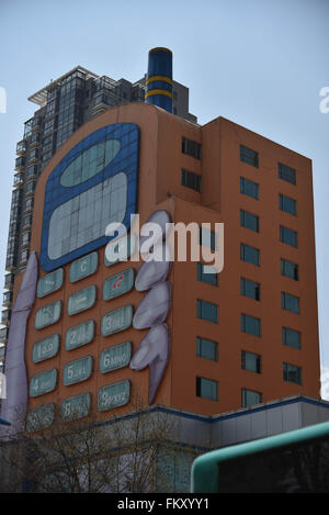 Kunming, Kunming, CHN. 10th Mar, 2016. A phone-shaped mall in Kunming. The buttons are windows and the screen is the top hall. It is considered as one of the most ugly buildings in a website's vote. © SIPA Asia/ZUMA Wire/Alamy Live News Stock Photo