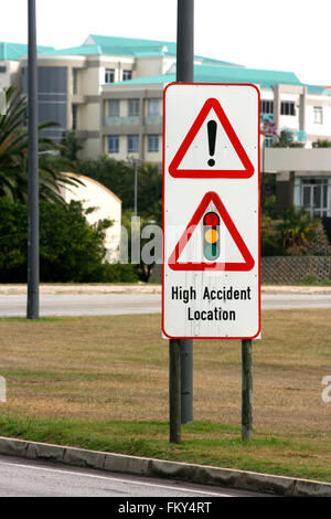 Warning sign at high accident area Stock Photo