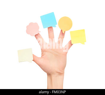 Multi-colored stickers on fingers of the hand. Stock Photo