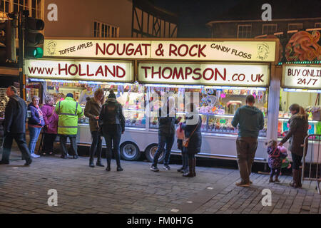 Stamford, Lincs, UK. 10th March 2016. Mid Lent Fair in Stamford town centre in the county of Lincolnshire, UK, attracted a lot of visitors to the attractions and stalls at the fair. The smells and the fairground rides made a great atmosphere in the town centre. Credit:  Jim Harrison/Alamy Live News Stock Photo