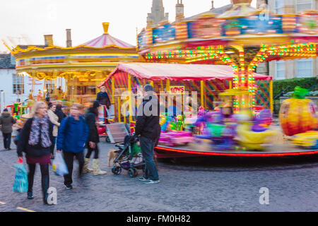 Stamford, Lincs, UK. 10th March 2016. Mid Lent Fair in Stamford town centre in the county of Lincolnshire, UK, attracted a lot of visitors to the attractions and stalls at the fair. The smells and the fairground rides made a great atmosphere in the town centre. Credit:  Jim Harrison/Alamy Live News Stock Photo