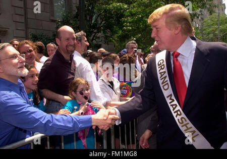 Real Estate mogul Donald Trump greets fans on May 23, 2004 as he marches as Grand Marshal in the 40th annual Salute to Israel Parade on Fifth Ave. The theme of this year's parade was visiting Israel, an effort to revive the sagging economy in the country due to the ongoing Palestinian terrorism. (© Richard B. Levine) Stock Photo