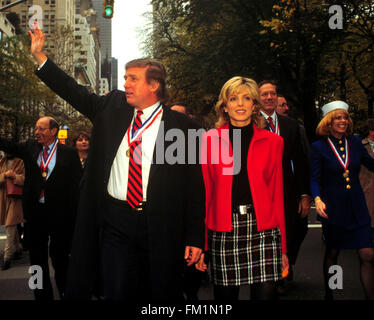 Donald Trump and Marla Maples march in the New York City Veteran's Day Parade on November 11, 1995.  Maples auctioned off a 7.45-carat diamond engagement   ring received from Donald Trump for $110,000 Friday, June 2, 2000.  Trump gave Maples the ring in the early 1990s. Maples and Trump married in 1993 and  divorced in 1997.  (© Frances M. Roberts) Stock Photo