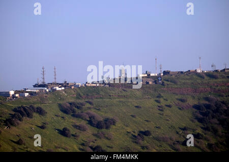 Distant view of the Israeli military advanced radar systems on Mount Bental across the Syrian side of Quneitra in the Golan heights Israel Stock Photo