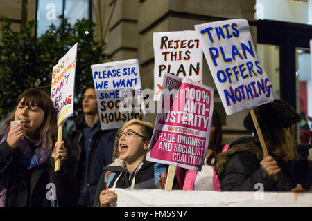 London, UK. 10th March, 2016. 11th March 2016. Demonstrators stage a protest outside the Old Town Hall in Newham, east London, demanding social housing be built on the Boleyn Ground redevelopment (formerly West Ham football ground). Campaigners want the current proposal by property developer, Galliard Homes to be rejected and 100% social housing built on the site instead. Credit:  London pix/Alamy Live News Stock Photo