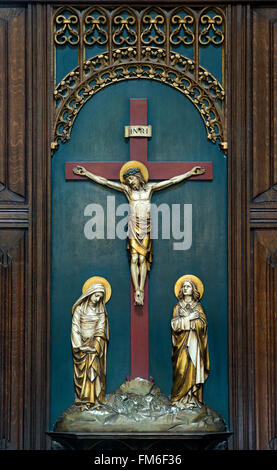 Jesus Christ crucified on the cross altar panel. Wells Cathedral, Somerset, England Stock Photo