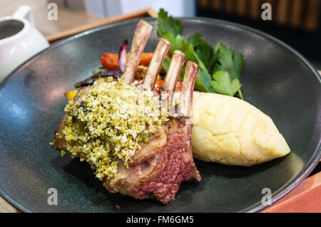 Rack of lamb with pistacio crust, served with mashed potatoes Stock Photo