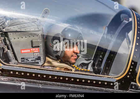 Pilot of the Al Fursan aerobatics display team from the United Arab Emirates Air Force in the cockpit of an Aermacchi MB-339 jet Stock Photo