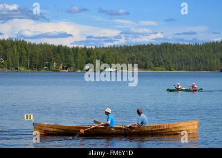 Finland, province of oriental Finland, Sulkava, wooden canoes on a lake in the channel of Alanne Stock Photo