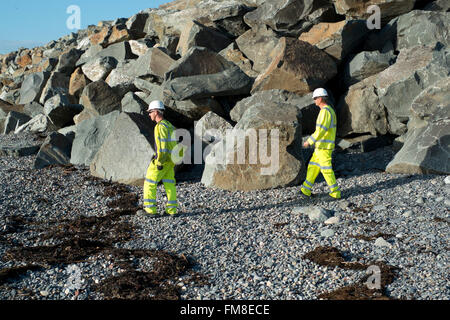 Stone brought by sea from Scandinavia  to form flood defences  at Borth upcoast from Aberystwyth on Cardigan Bay Wales. Stock Photo