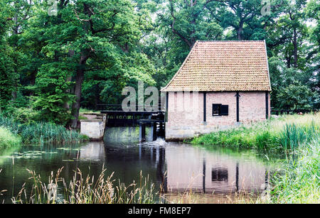old watermill with bridge in the dutch nature area Twente near the place Delden Stock Photo