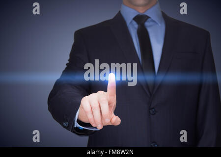 business, technology, internet and networking concept - businessman pressing button with contact on virtual screens. Stock Photo