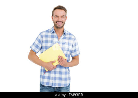 Happy young man holding folder Stock Photo