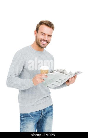 Young man holding disposable cup Stock Photo